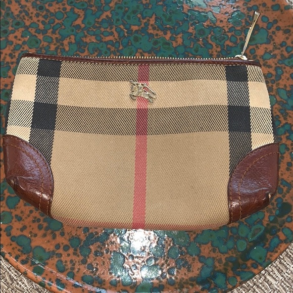 Burberry Handbags - Used but good shape makeup or carry pouch